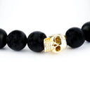 Black onyx with Shiny Gold Skull