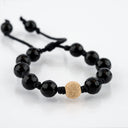 Faceted Black Onyx with Gold Stardust