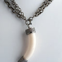 Ivory Horn with Diamond Top on 3 Strand Sterling Silver Chain. Can be worn short or long.