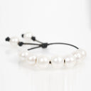 White Fresh Water Pearls on Black Leather Cord